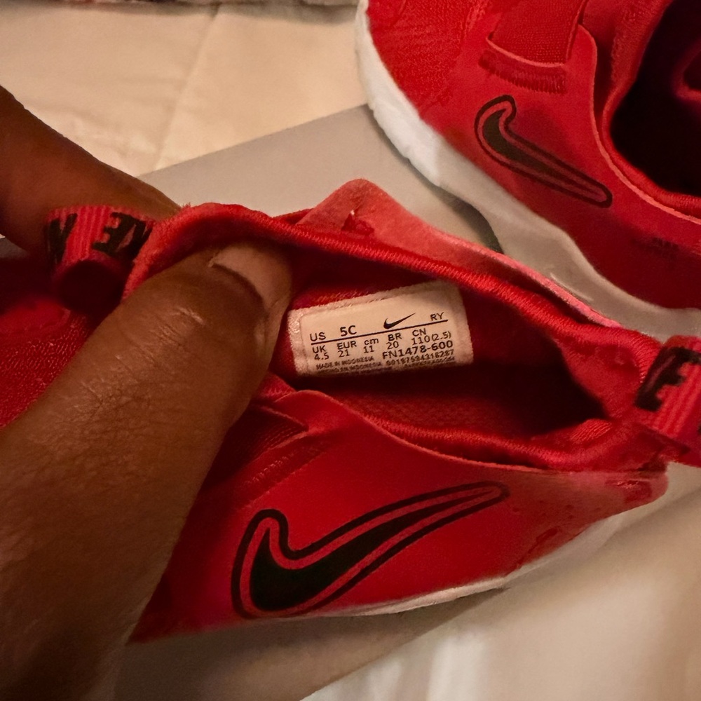 Nike Red Kids Slip-On Sneakers with Black Swoosh